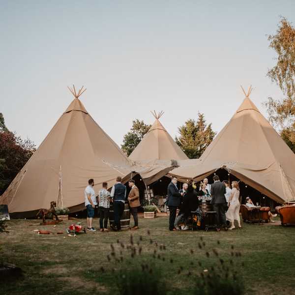 A wedding photo of the tipi venue